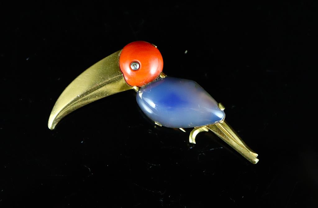 A mid 20th century French 18ct gold, coral and cabochon blue chalcedony? set Toucan clip brooch by J. Lacloche, Paris/Cannes,